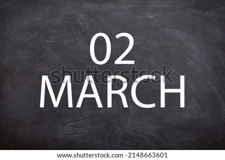 02 march text with blackboard background for calendar. And march is the third month of the year