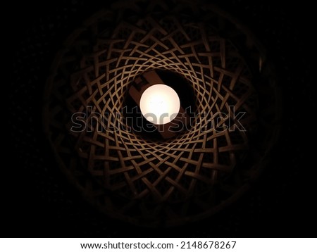 the lamp in the rattan lantern. usually found in restaurants

