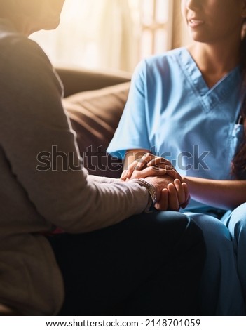 Ill be the support you need. Cropped shot of a nurse holding a senior womans hands in comfort. Royalty-Free Stock Photo #2148701059