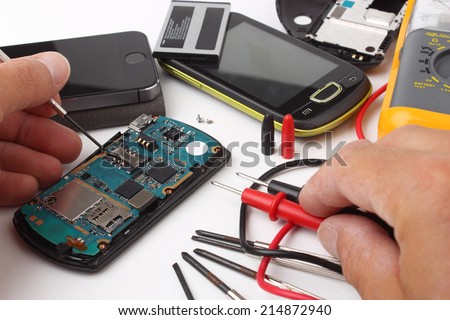 Mobile phone repair #2 Royalty-Free Stock Photo #214872940