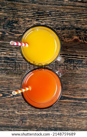 citrus natural real juice from red ripe and juicy grapefruit, made from juicy red grapefruits natural healthy juice Royalty-Free Stock Photo #2148759689