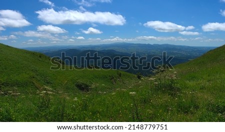 panoramic of the chain of Puys (volcanoes) of Puy-de-Dôme, view of the panoramic of Domes Royalty-Free Stock Photo #2148779751