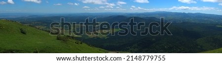 panoramic of the chain of Puys (volcanoes) of Puy-de-Dôme, view of the panoramic of Domes Royalty-Free Stock Photo #2148779755