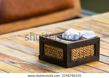 Tissues on the table in a restaurant.