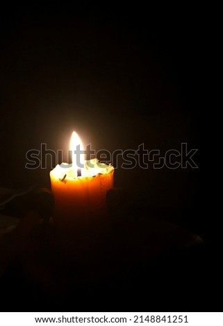 A candle in the darkness 