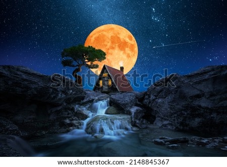 House over waterfall with starry sky and moon