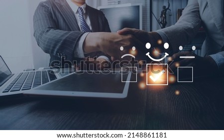 Customer service evaluation concept. Businessman pressing face smile emoticon show on virtual screen. Survey, poll or questionnaire for user experience or customer satisfaction research. Royalty-Free Stock Photo #2148861181
