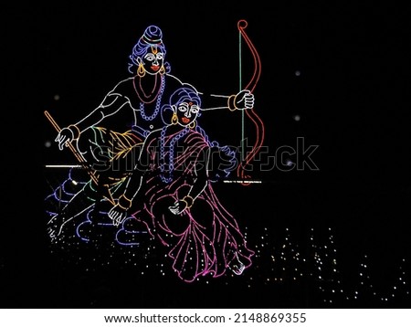 Hindu God Sri Rama and his wife Sita. Image made of tiny electric bulbs.                                Royalty-Free Stock Photo #2148869355