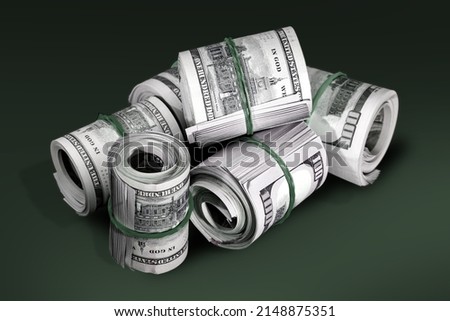 Gangster roll, bankroll, money roll, bundle of dollar money cash. Currency banknotes. Royalty-Free Stock Photo #2148875351