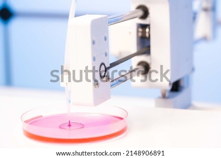 3D bioprinter ready  Biomaterials, tissue engineering concepts.  3D  bioprinting is the utilization of 3D printing  to combine cells, growth   biomaterials to make biomedical parts Royalty-Free Stock Photo #2148906891