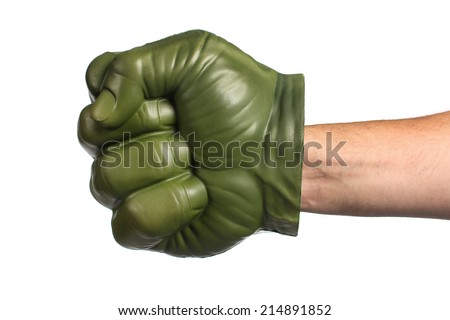 Green toy fist on a white background Royalty-Free Stock Photo #214891852