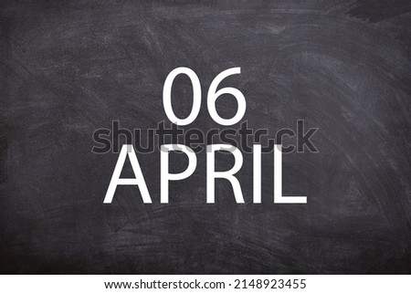 06 April text with blackboard background for calendar. And april is the fourth month of the year