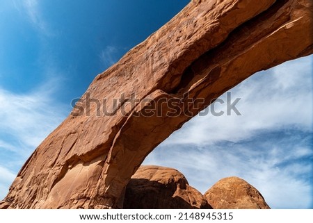 Arches National Park at Midday - Arches has many arches including the famous Delicate Arch, the Window Arch, the Double Arch and other features such as Tower of Babel, Turret Arch, and the Courthouse  Royalty-Free Stock Photo #2148945315