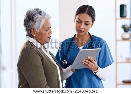 This might help you understand the condition better. Shot of a young doctor using a digital tablet during a consultation with a senior woman. Royalty-Free Stock Photo #2148946241