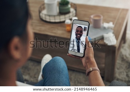 Doctors are available at the tap of a finger. Shot of an unrecognizable person on a videocall with a doctor. Royalty-Free Stock Photo #2148946465