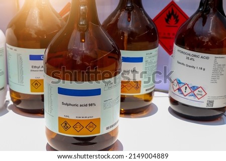 sulfuric acid in bottle, chemical in the laboratory and industry Royalty-Free Stock Photo #2149004889
