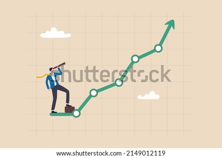 Investment upside potential, economy prediction or forecast, vision or analyze future, business growth or earning increase concept, businessman look through telescope to see investment growing graph. Royalty-Free Stock Photo #2149012119