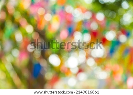 Bokeh from sunlight through tree shadow in the daytime for background, abstract or wallpaper.