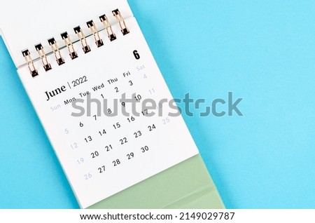 The June calendar 2022 on blue background. Royalty-Free Stock Photo #2149029787