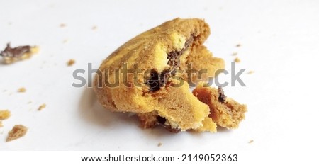 A beautiful picture of falling broke chocolatto biscuits  isolated on white background.- Image