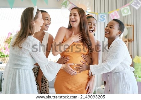 This is the best baby shower. Shot of a group of friends celebrating at a baby shower. Royalty-Free Stock Photo #2149093205