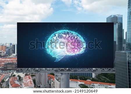 Brain hologram on billboard with Singapore cityscape background at day time. Street advertising poster. Front view. The largest science hub in Southeast Asia. Coding and high-tech science.