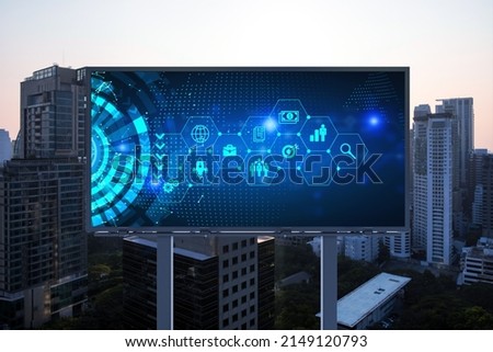 Hologram of Research and Development glowing icons on billboard. Sunset panoramic city view of Bangkok. Concept of innovative technologies to create new services and products in Southeast Asia.