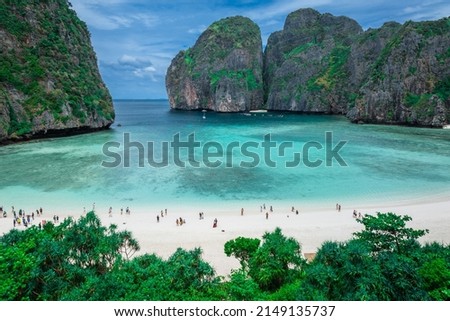 Aerial view of Maya bay. Maya Bay is the crown jewel of Phi Phi Islands in southern Thailand. It is situated in the Hat Noppharat Thara – Mu Ko Phi Phi National Park in Thailand. Royalty-Free Stock Photo #2149135737