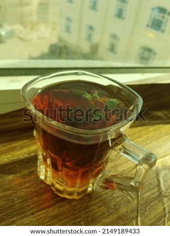 
A picture of a cup of tea, great taste and delicious with a beautiful view