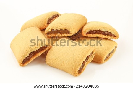 Pile of jam filled strudel biscuits isolated on white background Royalty-Free Stock Photo #2149204085
