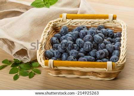 Blueberry with leaves in the bowl