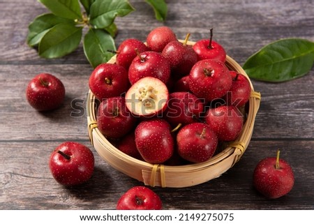 ripe hawthorn fruits on table Royalty-Free Stock Photo #2149275075