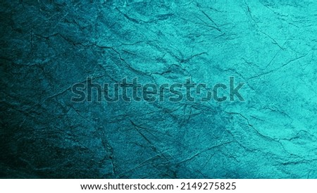 Blue green abstract background. Gradient. Toned rough cracked stone surface. Teal background with space for design. Royalty-Free Stock Photo #2149275825