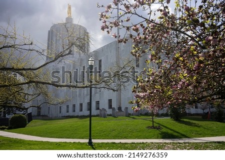 The Oregon State Capitol building against dramatic clouds on a beautiful spring day.