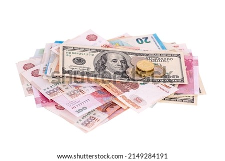 A bundle of money from different countries isolated on a white background