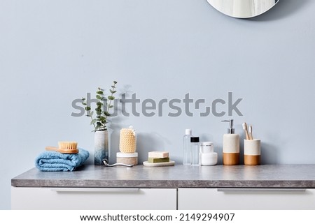 Female toilet table in bathroom with toiletries for hygiene and body care Royalty-Free Stock Photo #2149294907
