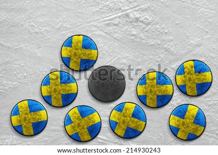 Pucks lying on a hockey rink. Texture, background 