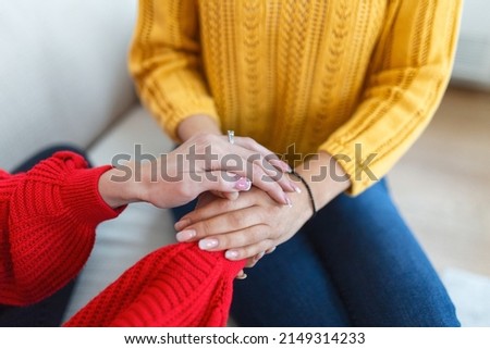 Closeup shot of two unrecognizable people holding hands in comfort. Be the person who helps the next. I'm here for you. Cropped shot of two unrecognizable people holding hands Royalty-Free Stock Photo #2149314233