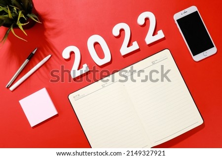 Happy new year 2022a digital material on red background