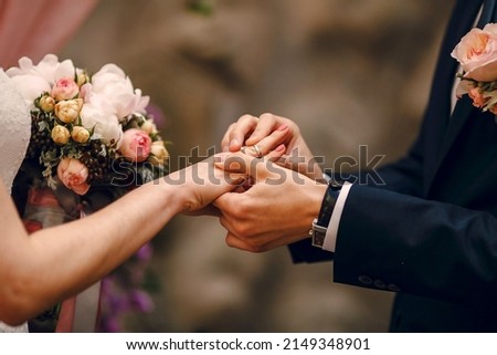 wedding ceremony with wear ring Royalty-Free Stock Photo #2149348901