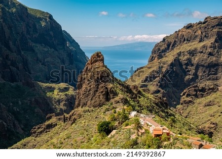 Tremendous Teno mountains at Tenerife north with village Masca within the gorge Barranco de Masca Royalty-Free Stock Photo #2149392867