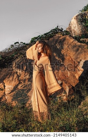 beautiful young stylish woman outdoors