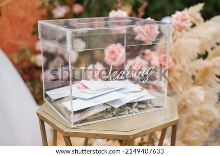 Glass box on wedding for invitation cards