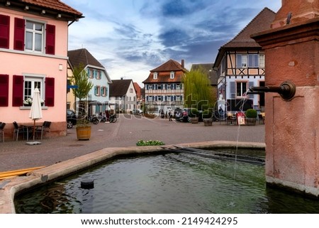 Fountain in Ettenheim with blurred city background. Ortenaukreis, Baden-Württemberg, Germany