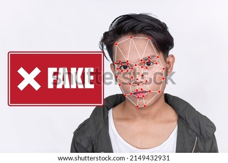 Photo of a male person identified as a fake. Facial recognition and deepfake detection software concept.