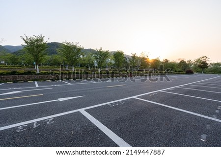 Parking lot in city during sunset
