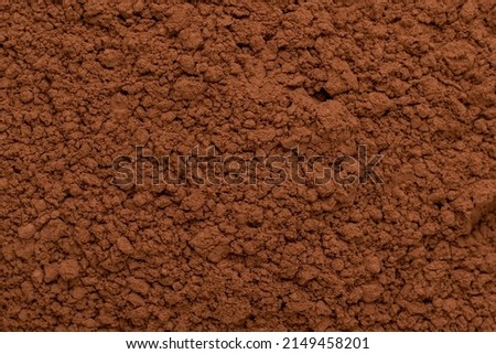 Cocoa powder background. Full frame.