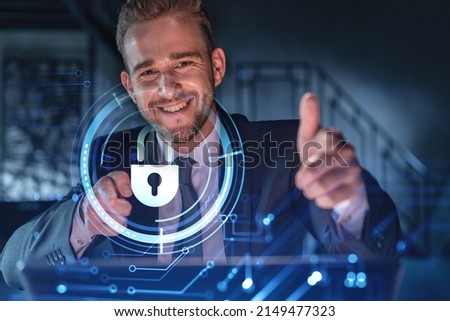 Portrait of handsome businessman thinking how to protect clients confidential information and cyber security. IT hologram padlock icons over office background.