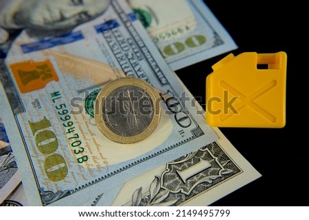 American dollar, Bulgarian lev and a fuel canister on a black background. The concept of the cost of gasoline, diesel
