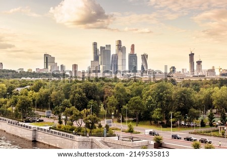 Moscow skyline, Russia. Scenic panorama of Luzhniki Park and Moscow-City tall buildings in distance. Sunny view of Moskva River green embankment, modern Moscow cityscape in summer. Royalty-Free Stock Photo #2149535813
